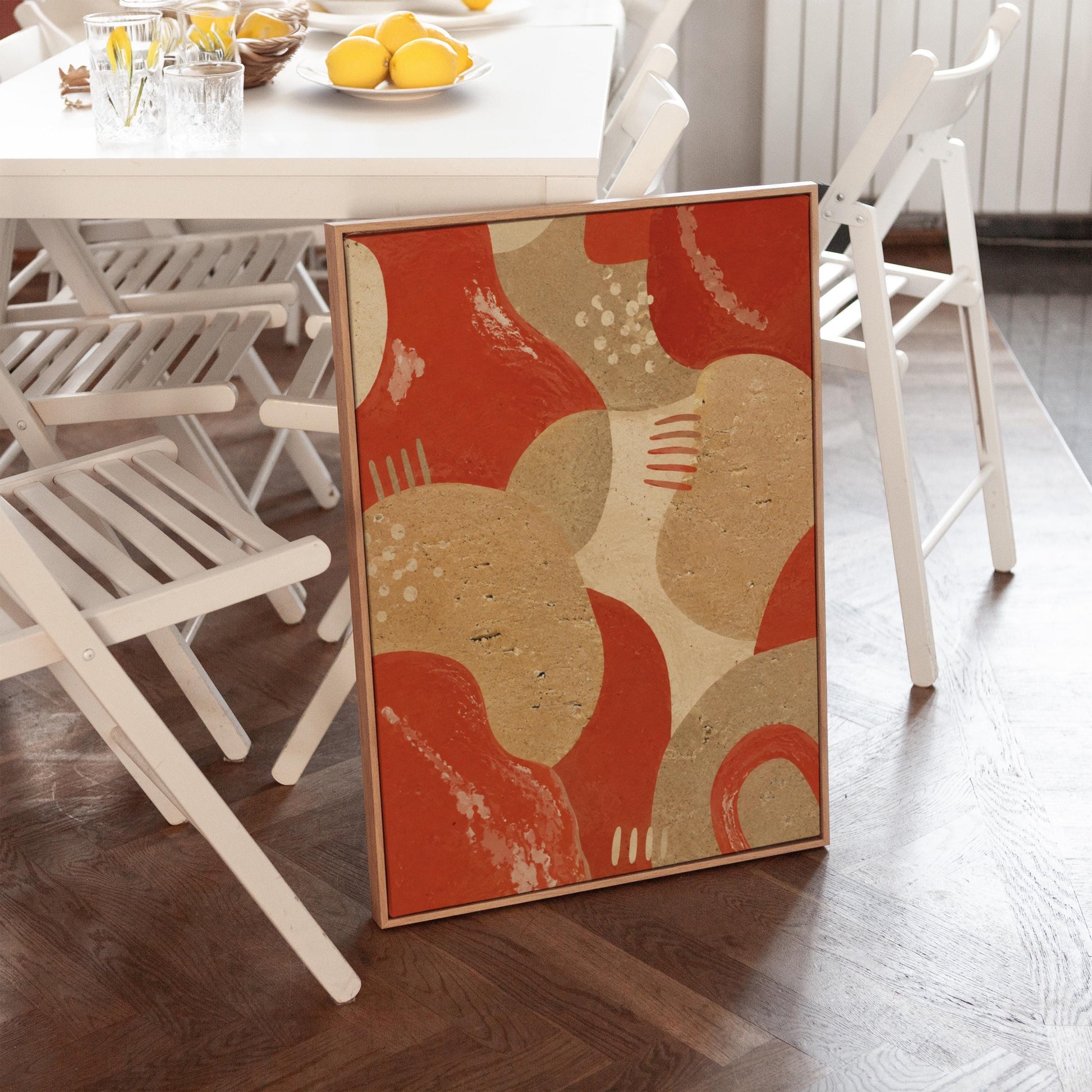 Interlocking terracotta and beige organic shapes, canvas print shown to scale in a furnished room