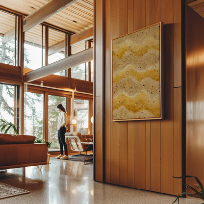Flowing golden ochre wave layers, canvas print shown to scale in a furnished room