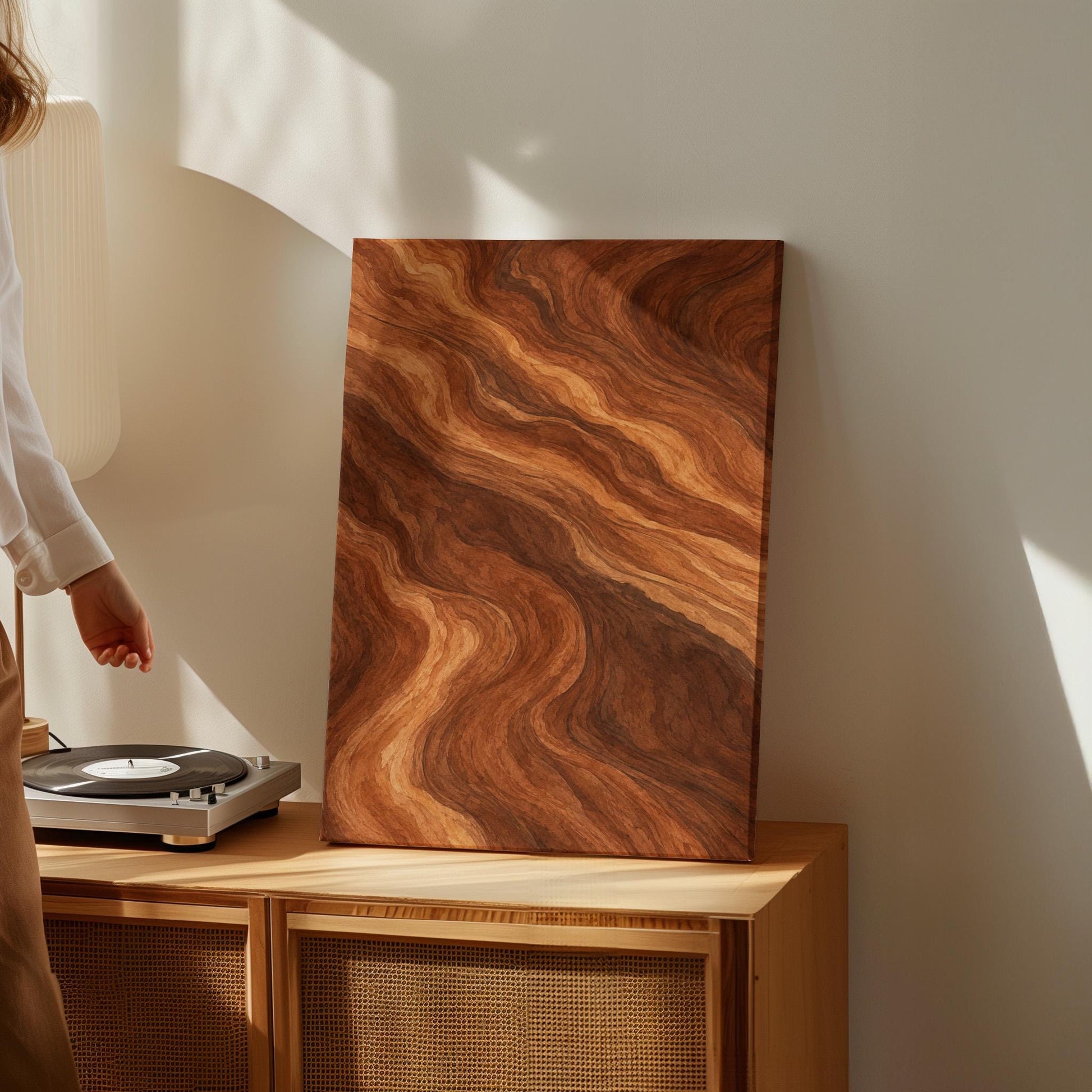 Flowing copper and auburn swirl currents, canvas wall art on a quiet wall in a considered interior