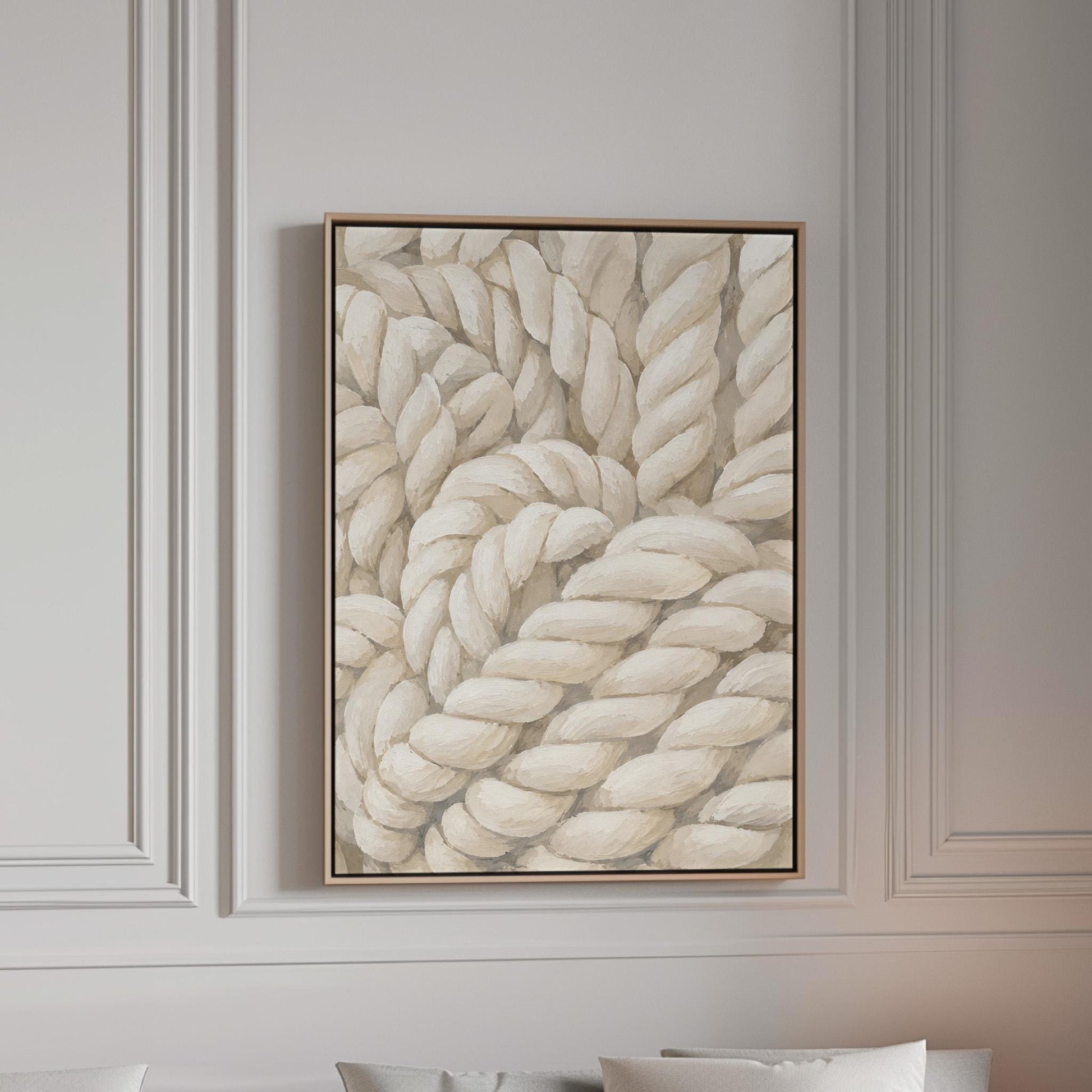Thick cream ropes twisted into a knot, canvas print in a bright room with natural daylight