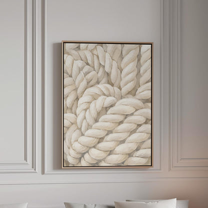 Thick cream ropes twisted into a knot, canvas print in a bright room with natural daylight