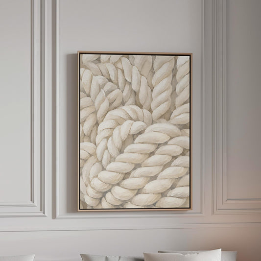 Thick cream ropes twisted into a knot, canvas print in a bright room with natural daylight