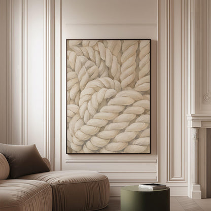 Thick cream ropes twisted into a knot, canvas print on a softly lit wall in a calm interior