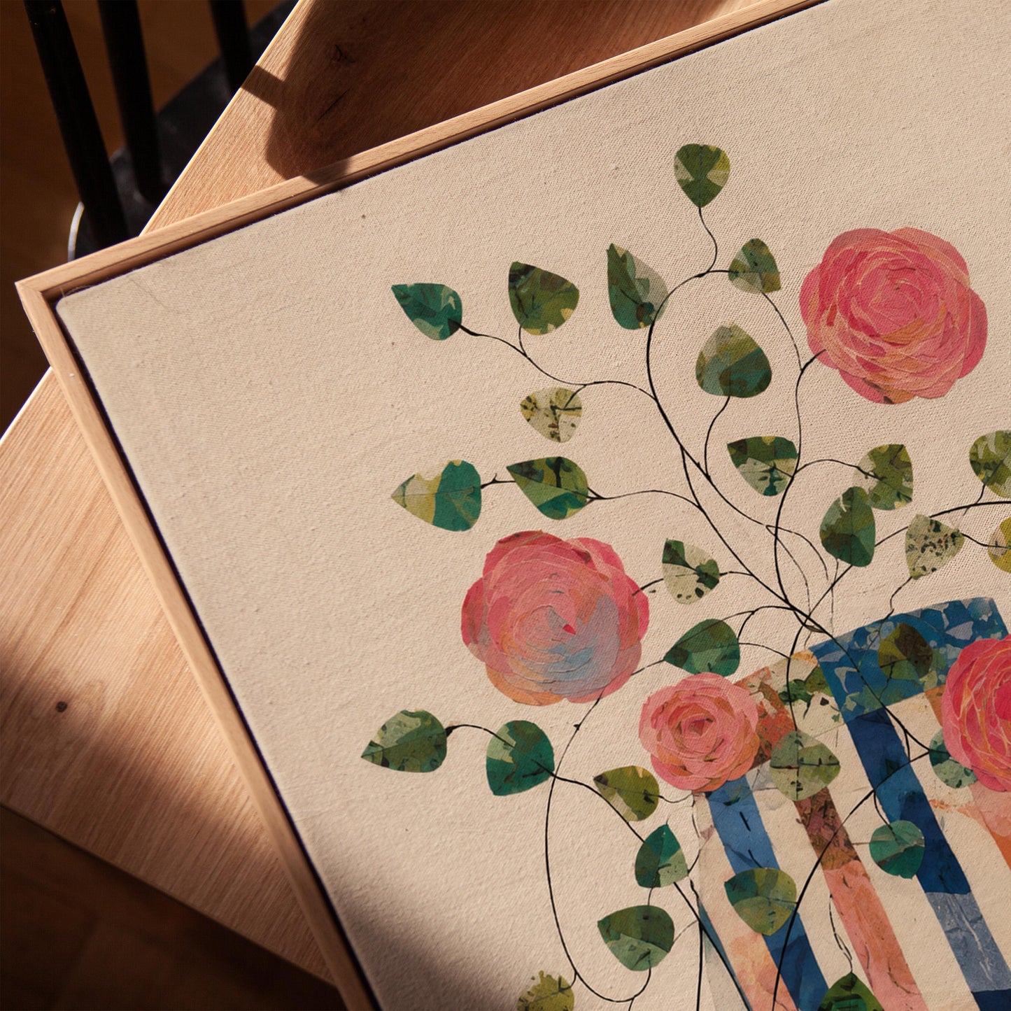 Climbing roses around a striped collage vase, canvas print in a warm, minimally styled interior