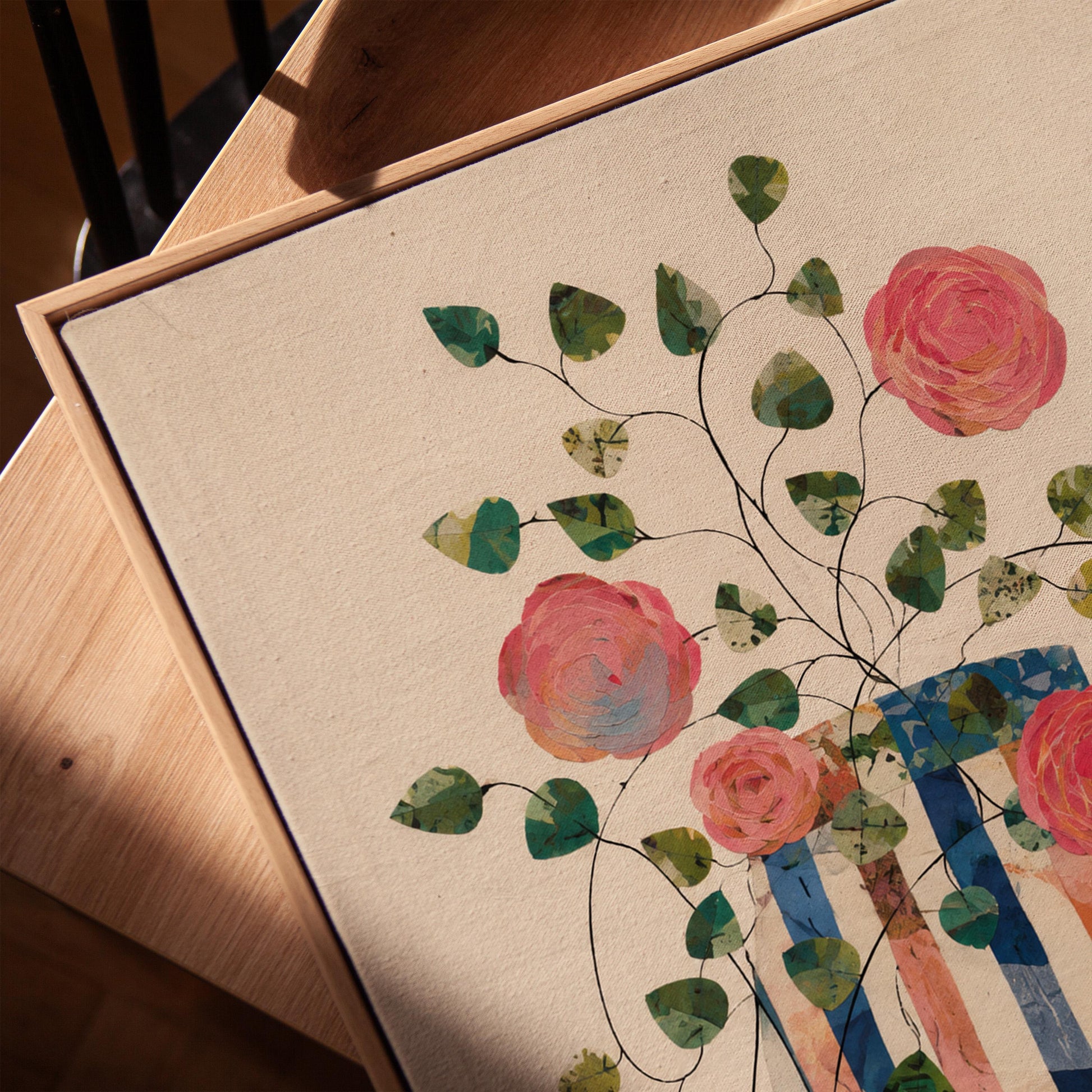 Climbing roses around a striped collage vase, canvas print in a warm, minimally styled interior