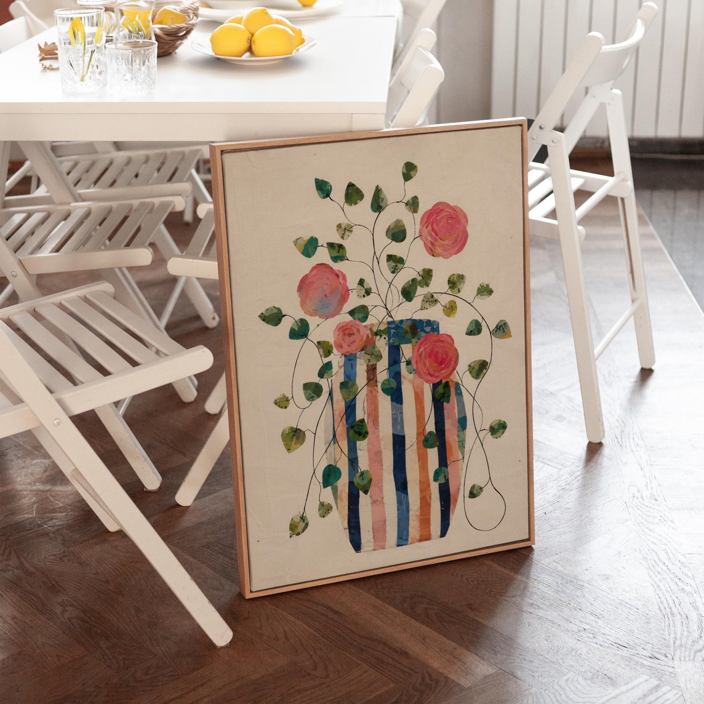 Climbing roses around a striped collage vase, canvas print seen in a warm interior with natural light