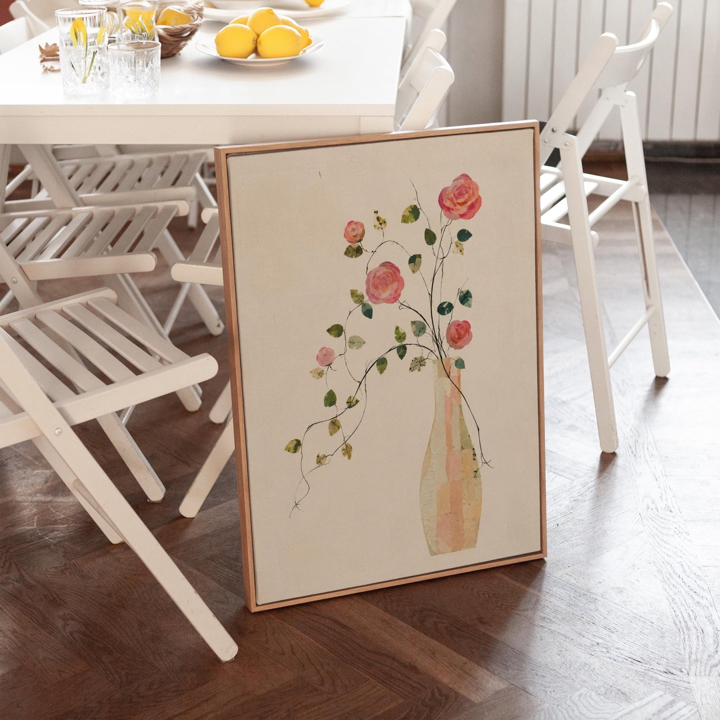 Single rose with trailing vine in slim vase, canvas print seen in a warm interior with natural light
