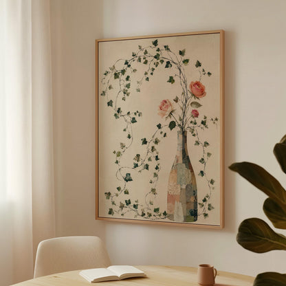 Ivy vines and single rose trailing from bottle vase, canvas wall art styled against a soft white wall