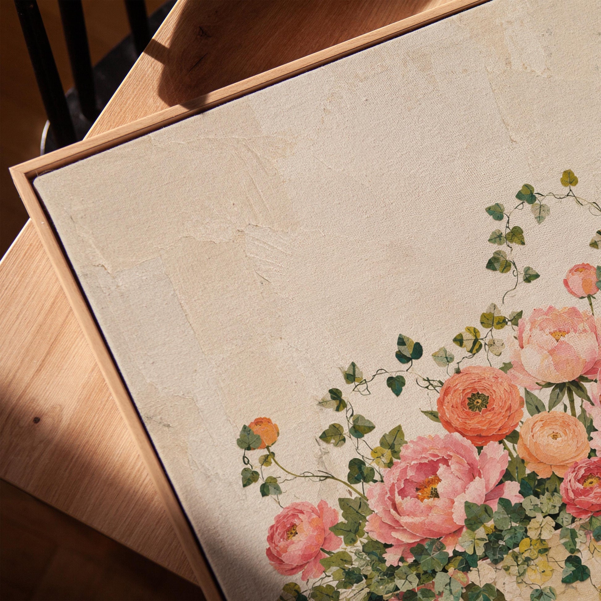 Blush peonies in bowl with cascading ivy, canvas print in a warm, minimally styled interior