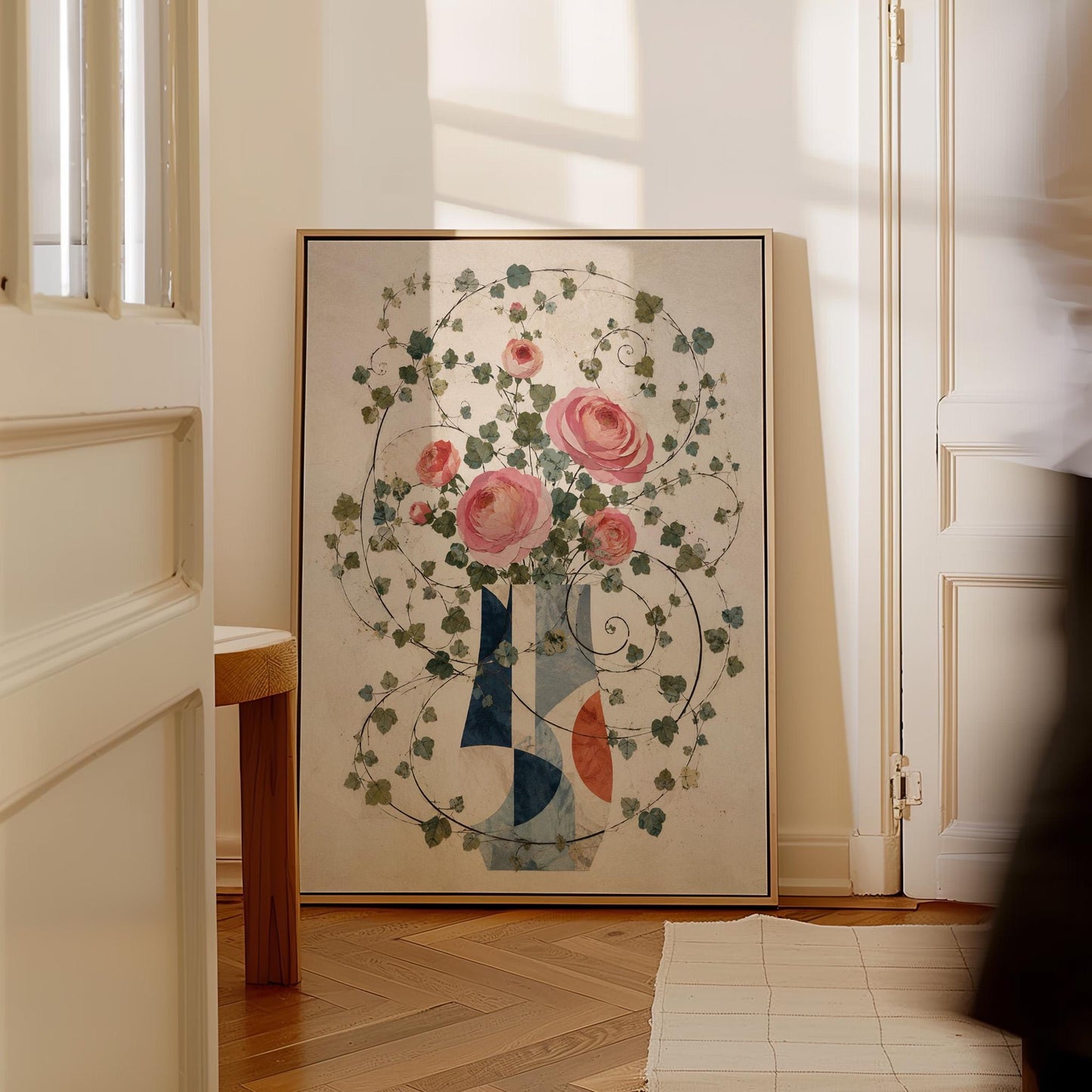 Roses on wildly curling vines above geometric vase, canvas wall art seen in a warm interior with natural light