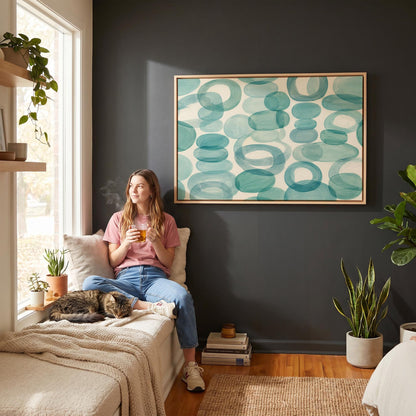 Overlapping aqua rings rolling across horizontal frame, canvas print hanging in a calm, modern living space