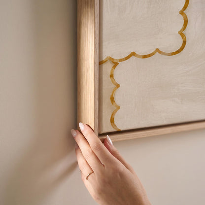 Scalloped edge tiles with gold outline in cream, canvas print shown at full size in a light-filled bedroom