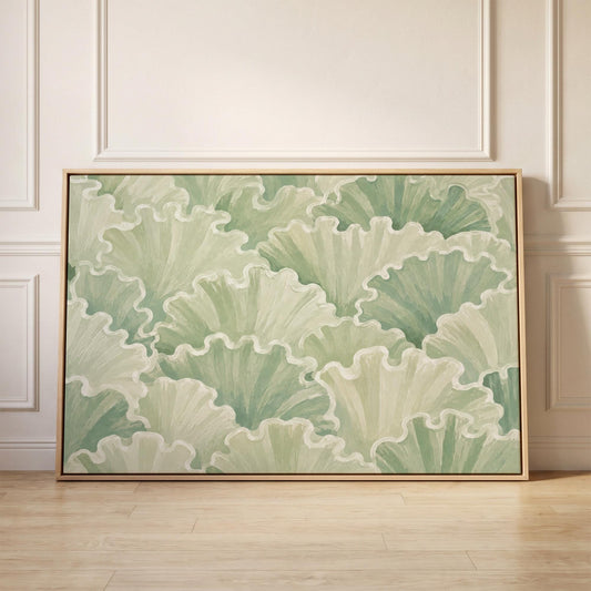 Ruffled leafy fan shapes in sage green rows, canvas print held up against a sunlit bedroom wall