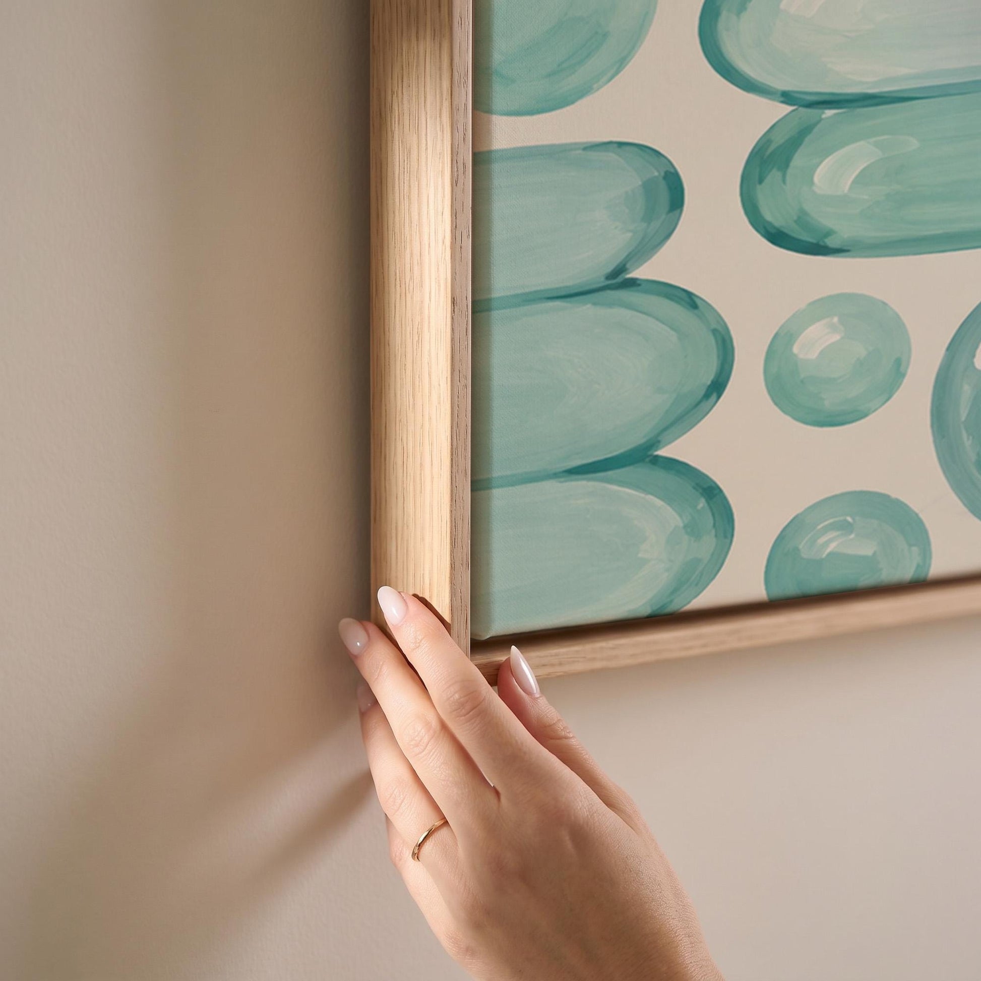 Rows of teal water drop and capsule shapes, canvas print shown at full size in a light-filled bedroom