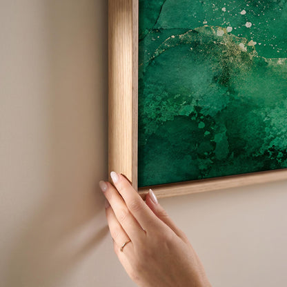 Wide emerald green watercolor wash, canvas print shown at full size in a light-filled bedroom