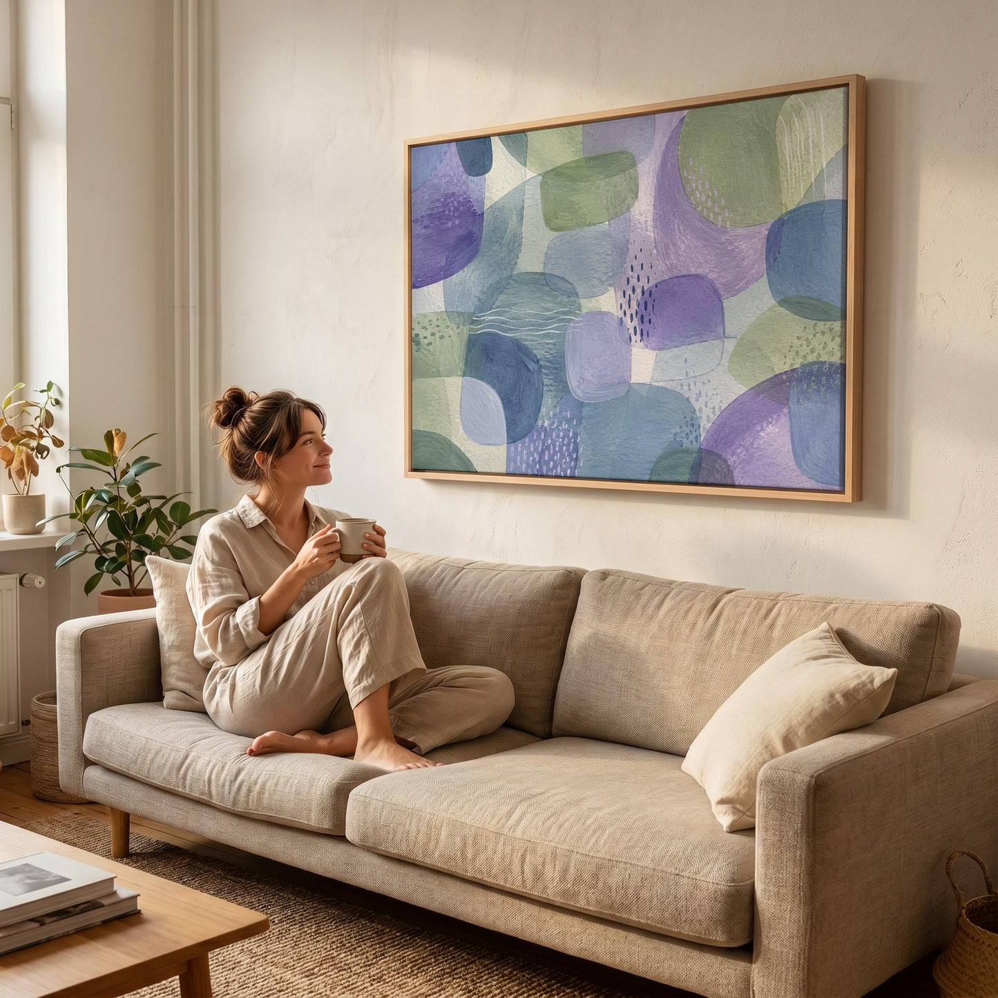 Soft muted shapes in dusty plum and sage, canvas print presented in a light, minimal room