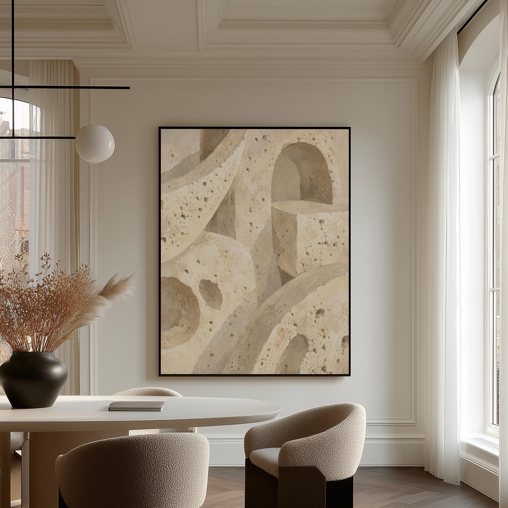 Interlocking arches and organic forms in warm speckled beige, canvas wall art hanging in a calm, modern living space