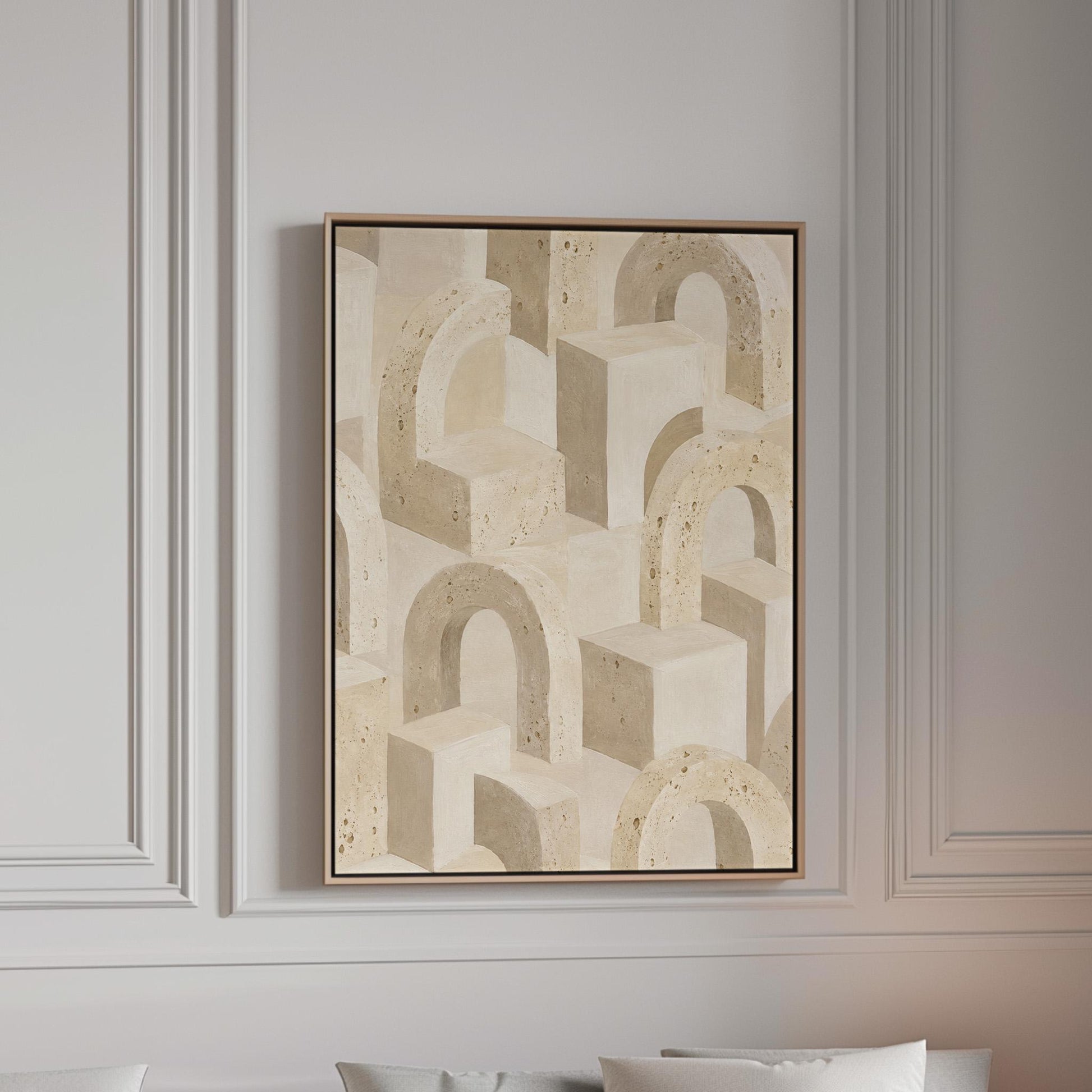 Repeating small arches pattern in sand and taupe tones, canvas print in a bright room with natural daylight
