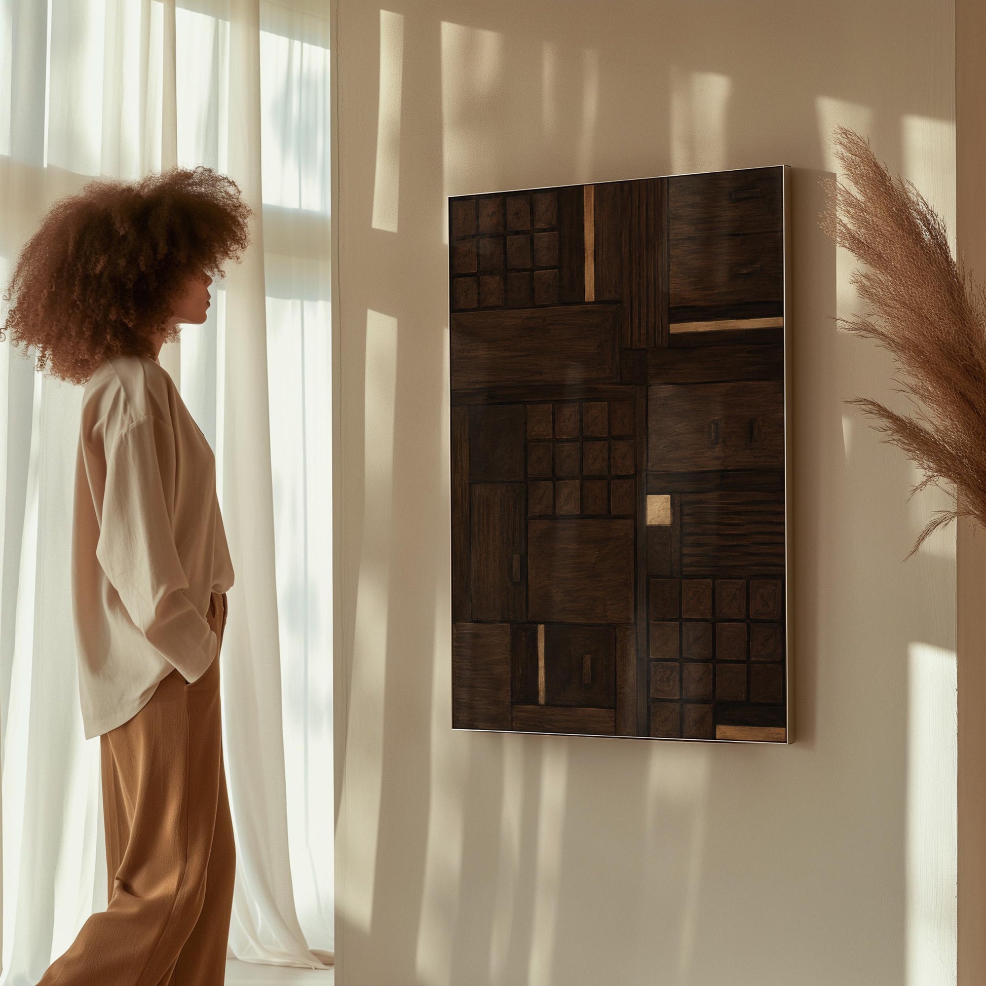 Dark espresso brown geometric patchwork with small gold accents, canvas wall art styled against a soft white wall