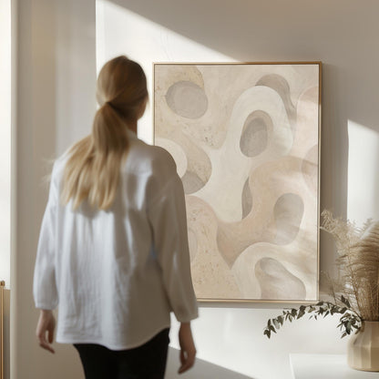 Soft organic flowing shapes in cream and light beige, canvas print presented in a light, minimal room