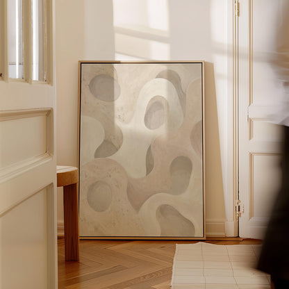 Soft organic flowing shapes in cream and light beige, canvas print on a quiet wall in a considered interior