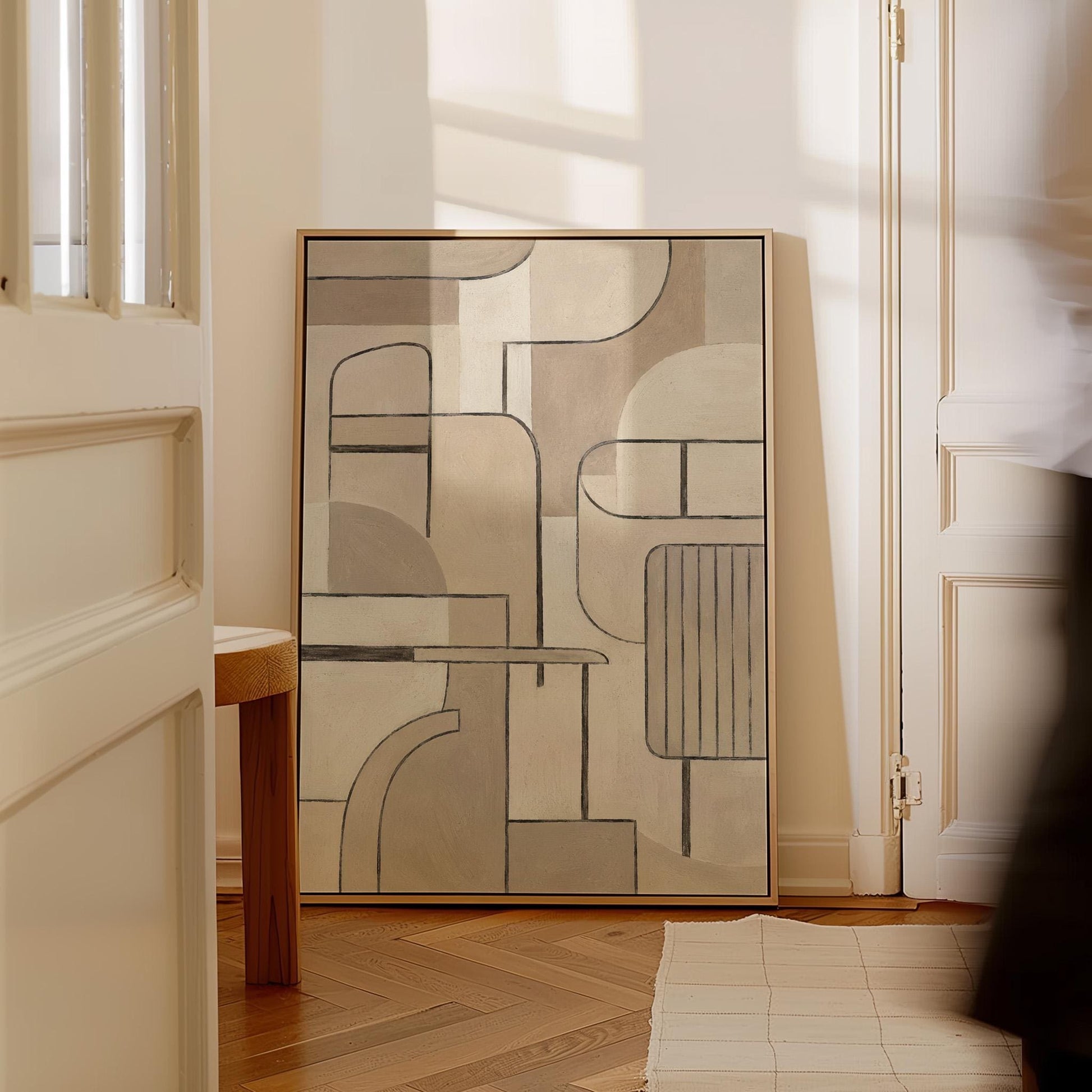 Bauhaus inspired line composition with geometric shapes in beige tones, canvas print shown to scale in a furnished room