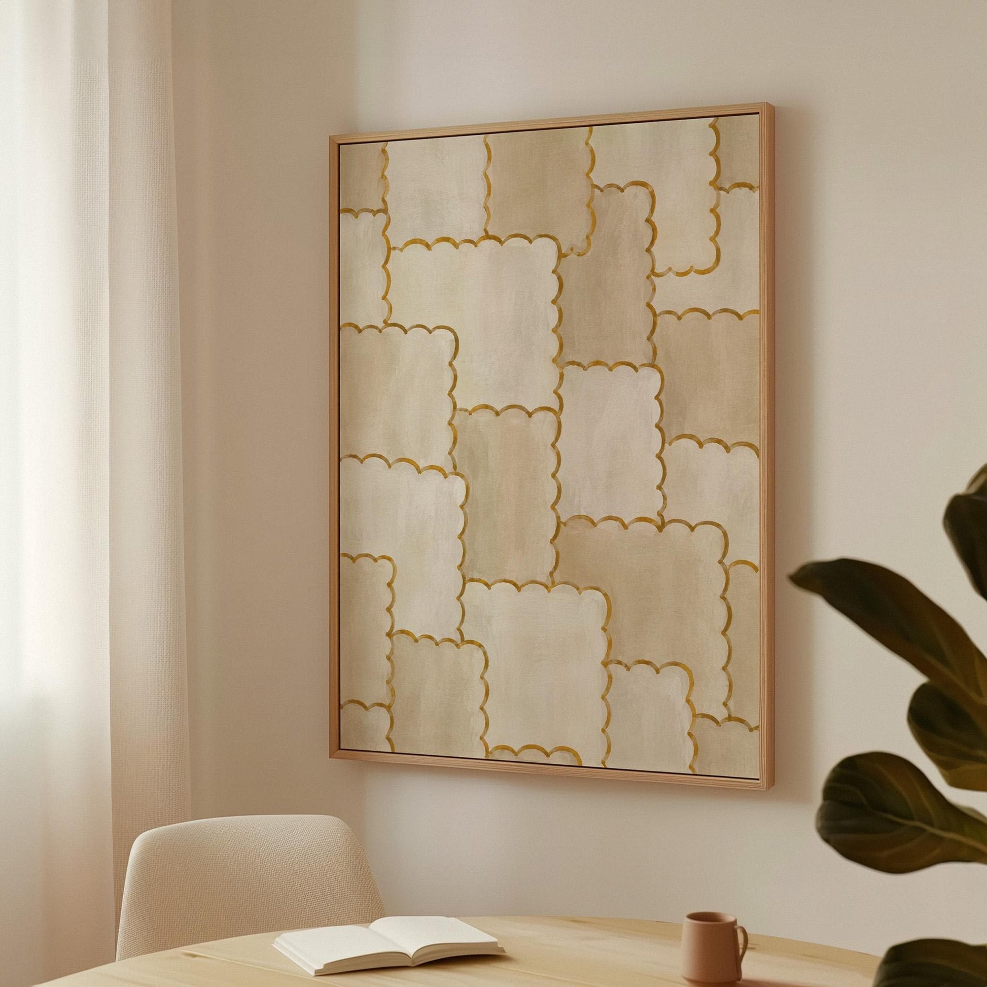 Overlapping tile pattern with scalloped gold edges in beige, canvas wall art seen in a warm interior with natural light