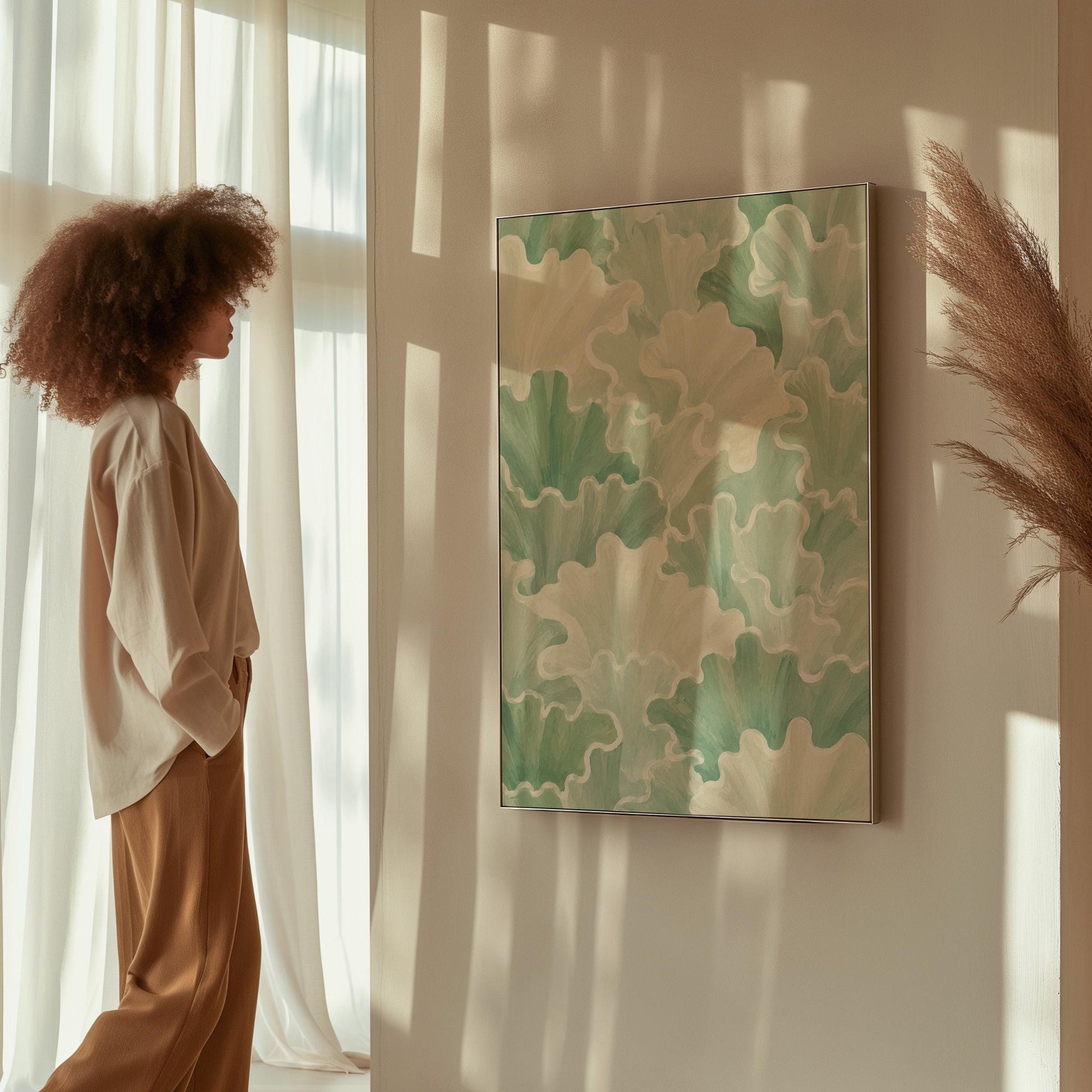 Fan shaped leafy forms in soft sage green watercolor, canvas print styled against a soft white wall