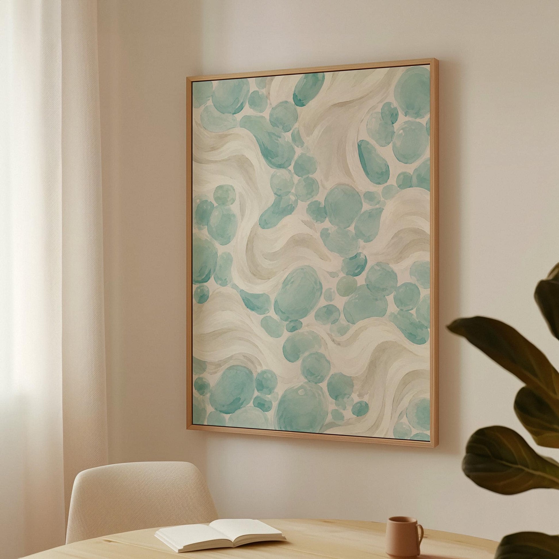 Aqua pebble shapes drifting among soft cream waves, canvas print displayed on a neutral wall in a styled interior