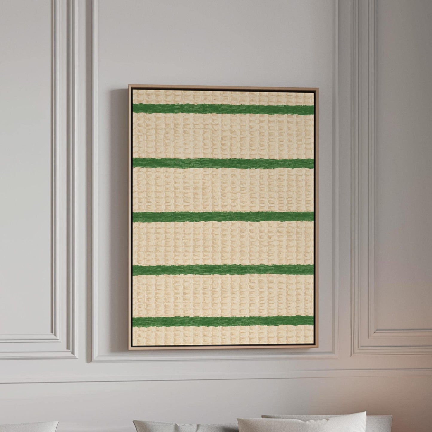 Horizontal grass green stripes on a cream background, canvas print in a bright room with natural daylight