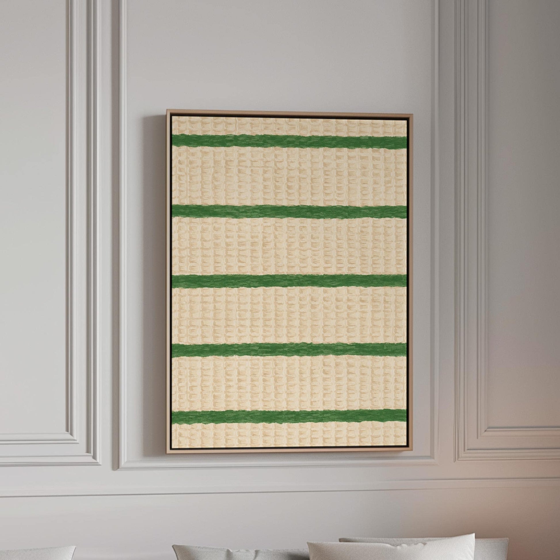 Horizontal grass green stripes on a cream background, canvas print in a bright room with natural daylight