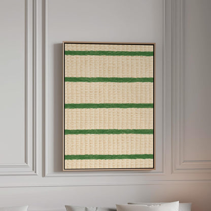 Horizontal grass green stripes on a cream background, canvas print in a bright room with natural daylight