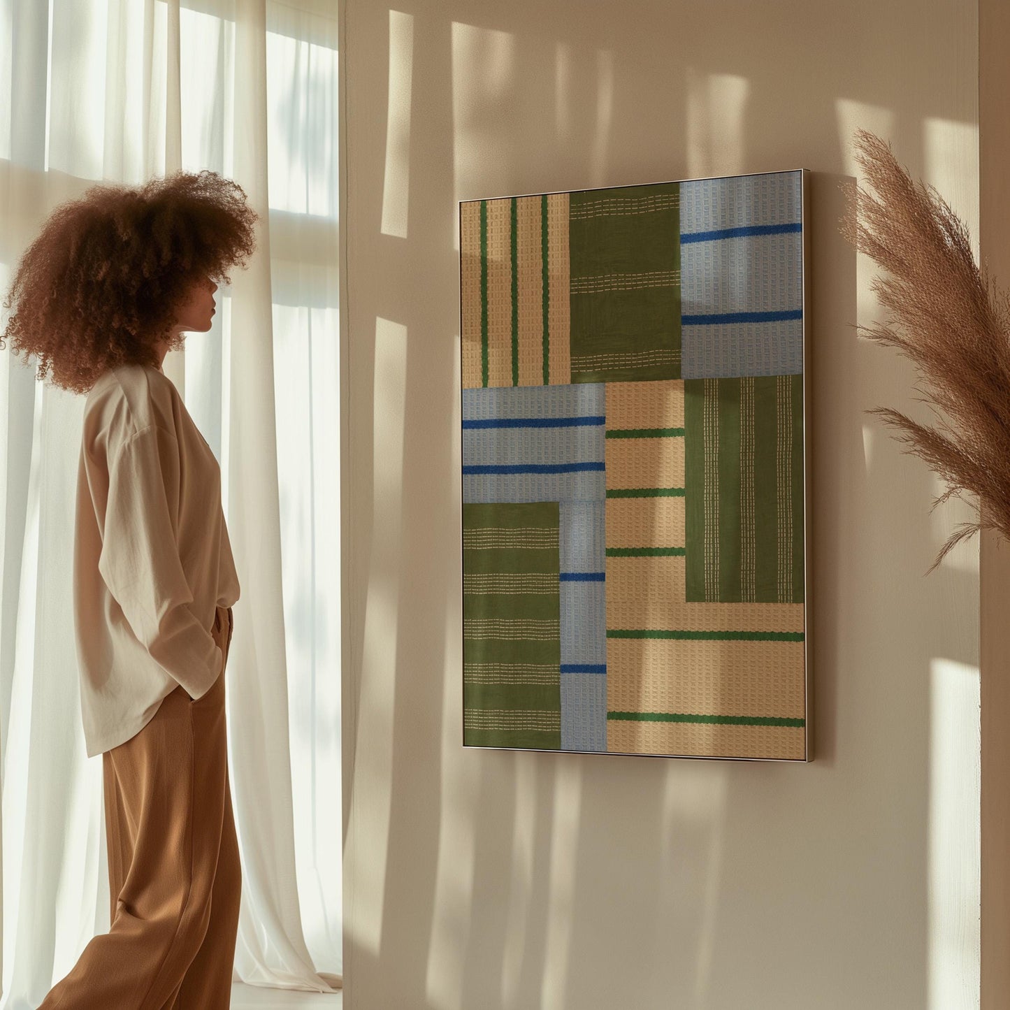 Patchwork of sage green fields with periwinkle blue bands, canvas wall art hanging in a calm, modern living space