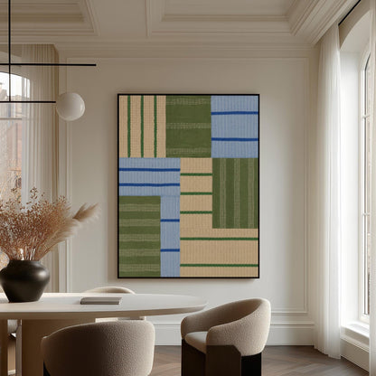 Patchwork of sage green fields with periwinkle blue bands, canvas wall art seen in a warm interior with natural light