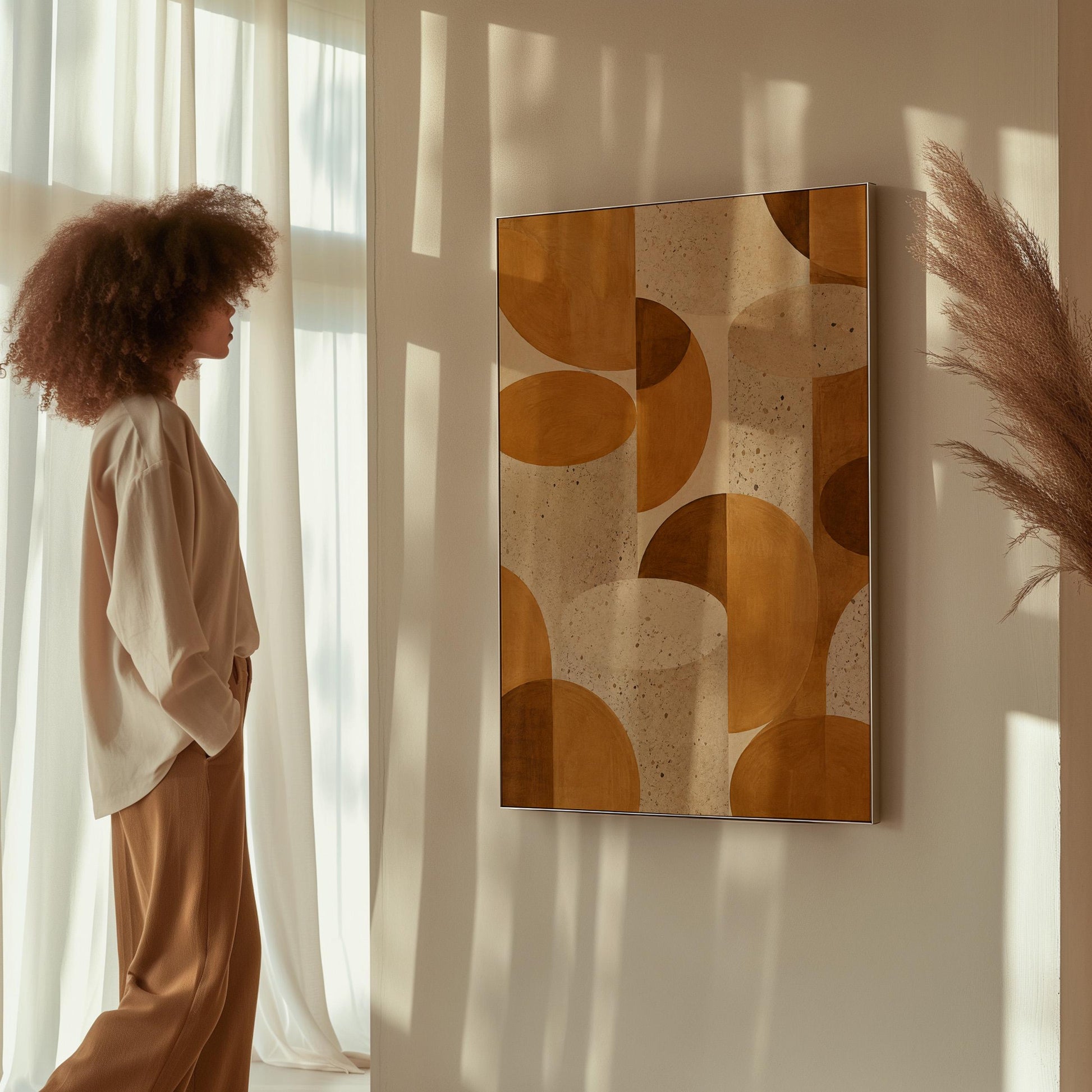 Warm caramel geometric shapes on speckled cream background, canvas wall art hanging in a calm, modern living space