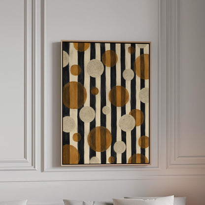 Amber and cream circles scattered over black vertical stripes, canvas print in a bright room with natural daylight