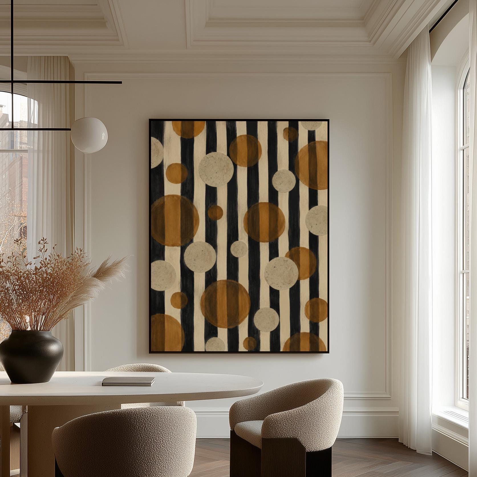 Amber and cream circles scattered over black vertical stripes, canvas print hanging in a calm, modern living space