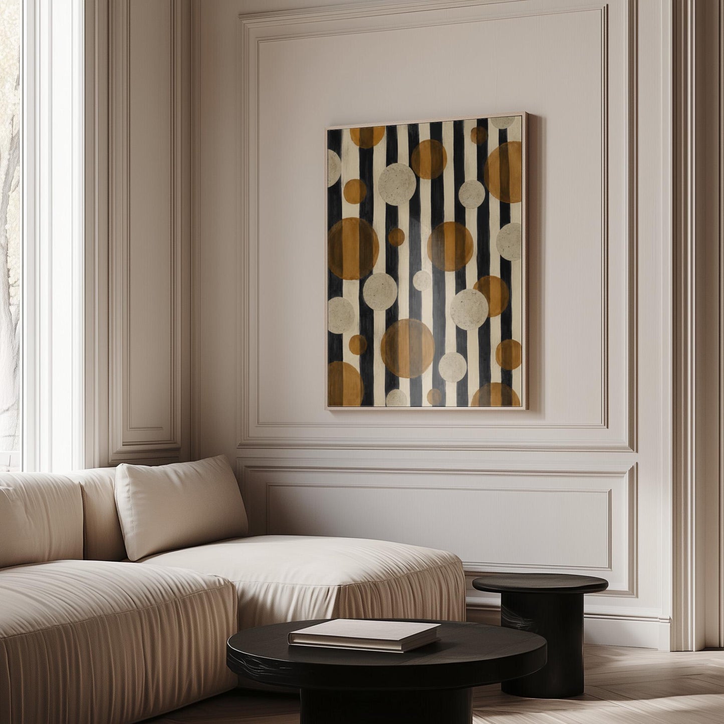 Amber and cream circles scattered over black vertical stripes, canvas print seen in a warm interior with natural light