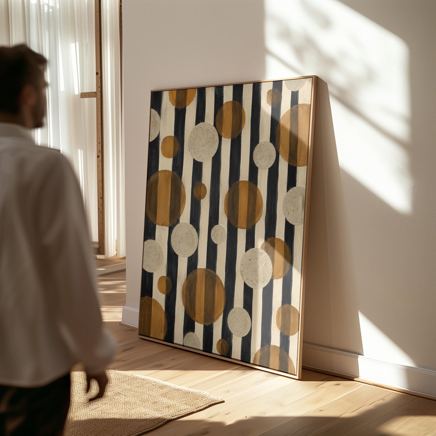 Amber and cream circles scattered over black vertical stripes, canvas wall art seen in a warm interior with natural light