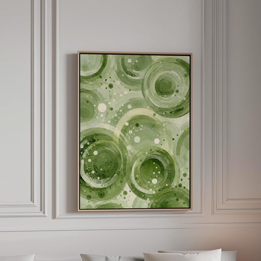 Rings and bubbles swirling in sage green watercolor, canvas print in a bright room with natural daylight