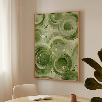 Rings and bubbles swirling in sage green watercolor, canvas print shown in a sunlit, contemporary room