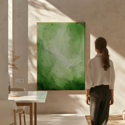 Loose watercolor wash in deep moss and forest greens, canvas print hanging in a calm, modern living space