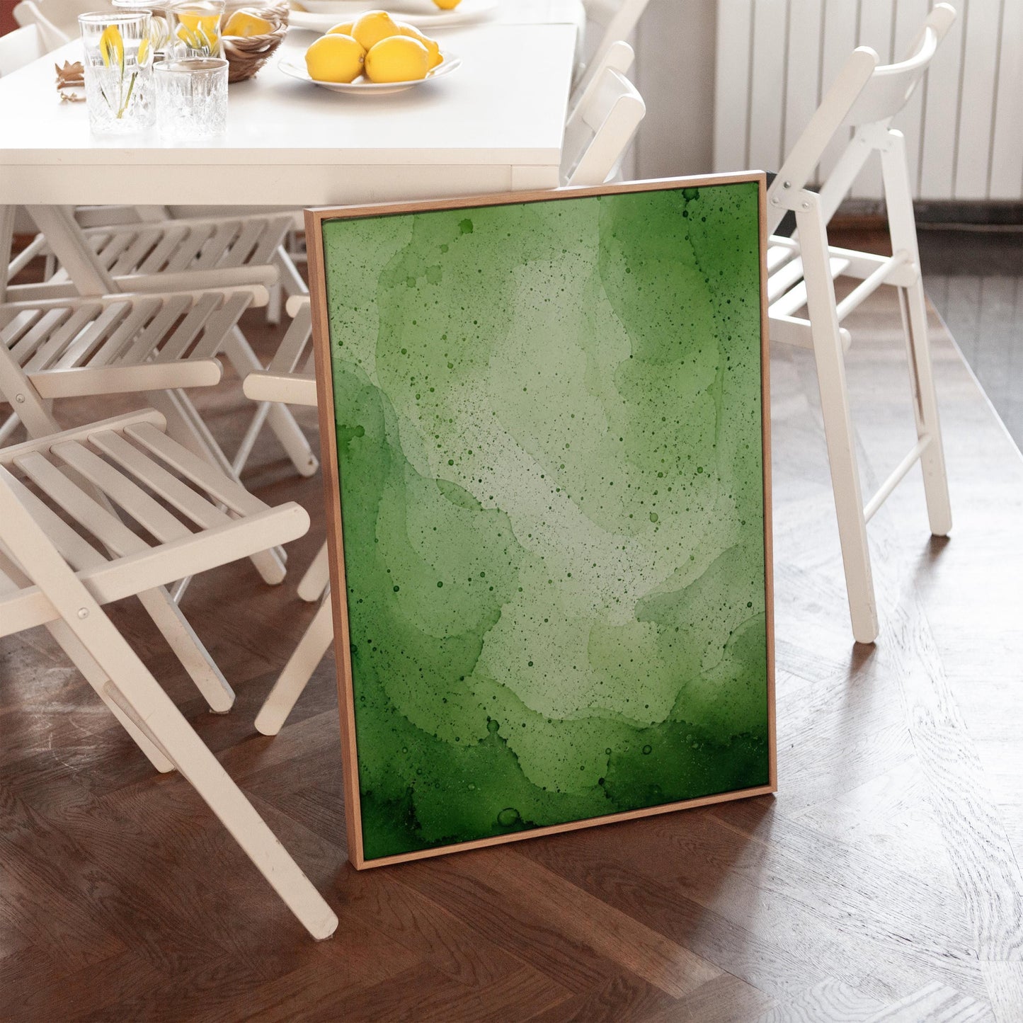 Loose watercolor wash in deep moss and forest greens, canvas print shown in a sunlit, contemporary room