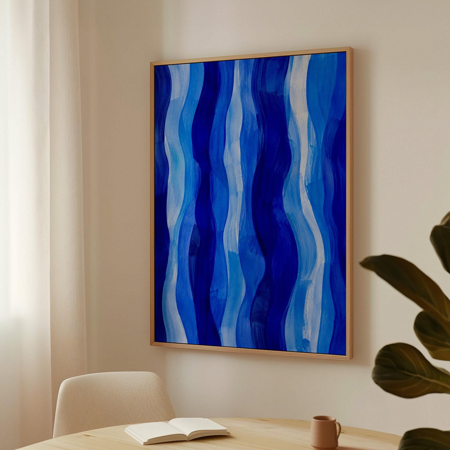 Vertical flowing ribbons in cobalt and light blue, canvas wall art styled against a soft white wall