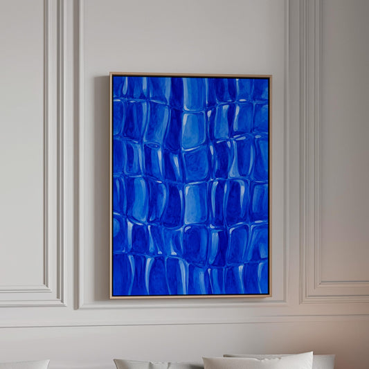 Mosaic of rounded royal blue shapes like cobblestones, canvas print in a bright room with natural daylight