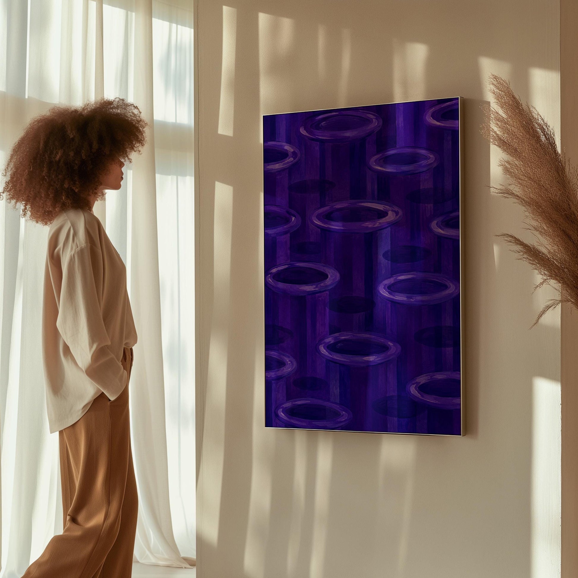 Rings emerging from deep violet and amethyst tones, canvas print shown to scale in a furnished room