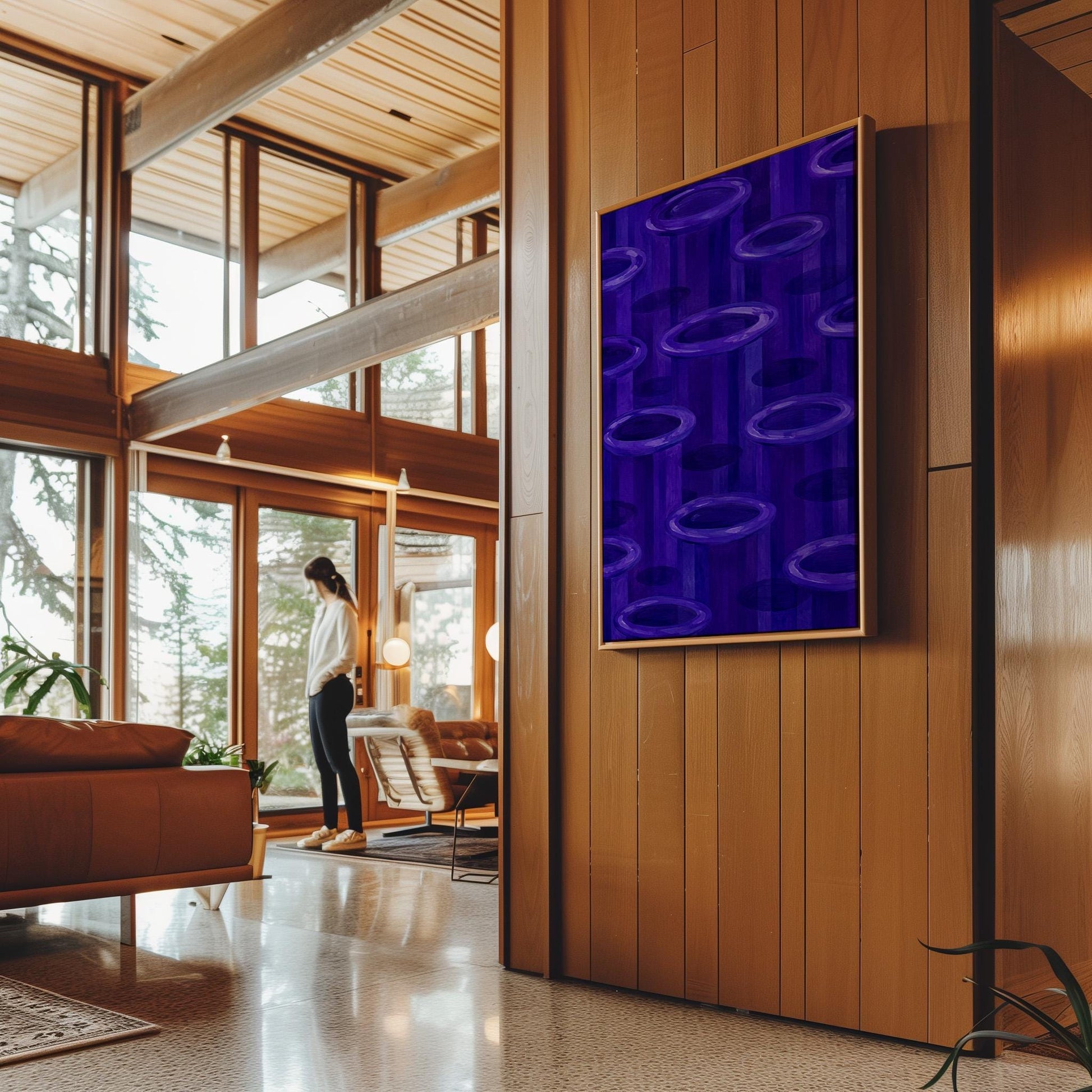 Rings emerging from deep violet and amethyst tones, canvas wall art seen in a warm interior with natural light
