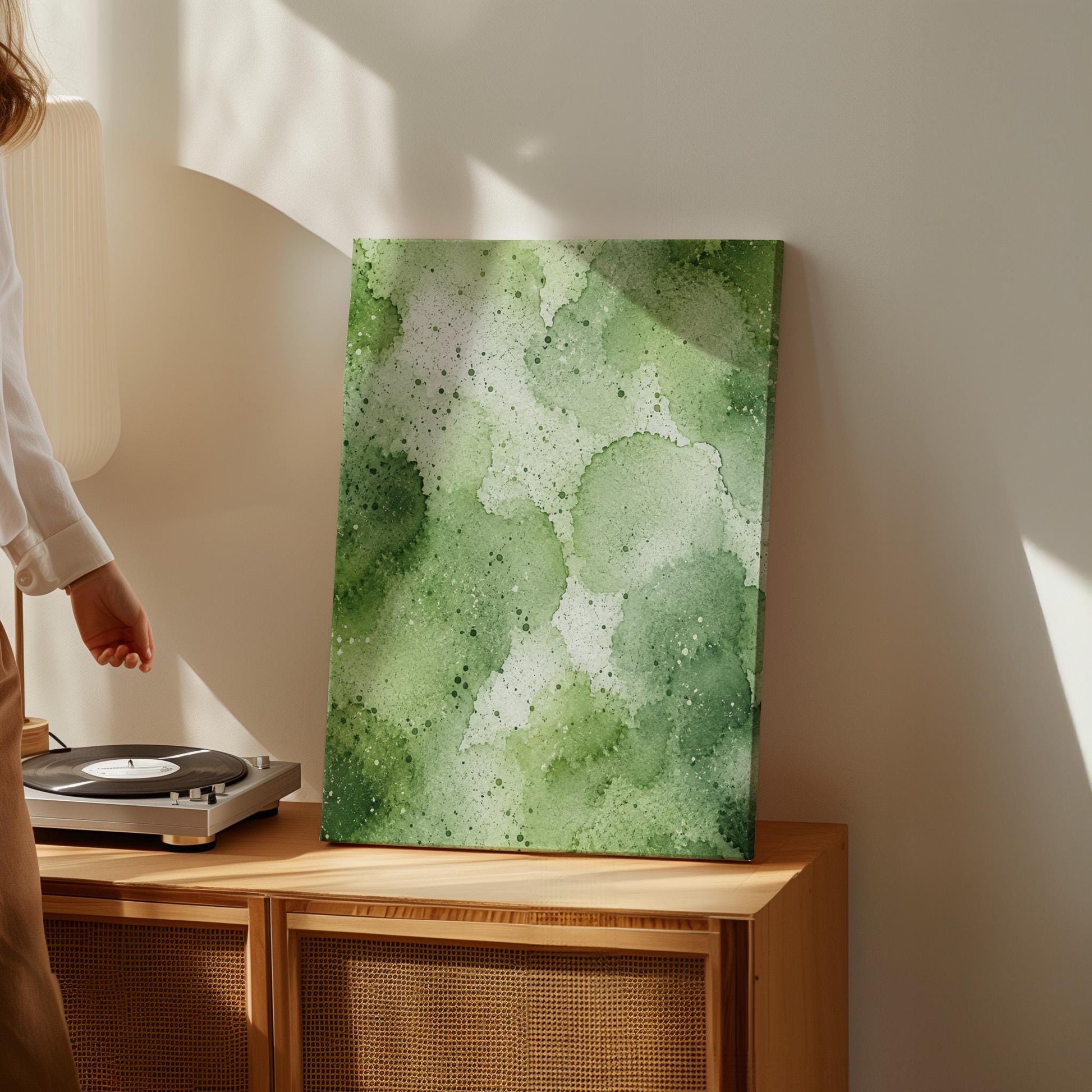 Pale speckled green watercolor wash, light and airy, canvas print styled against a soft white wall