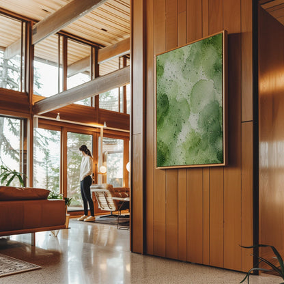 Pale speckled green watercolor wash, light and airy, canvas wall art on a quiet wall in a considered interior