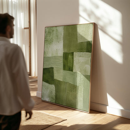 Patchwork of olive and moss green field blocks, canvas print seen in a warm interior with natural light